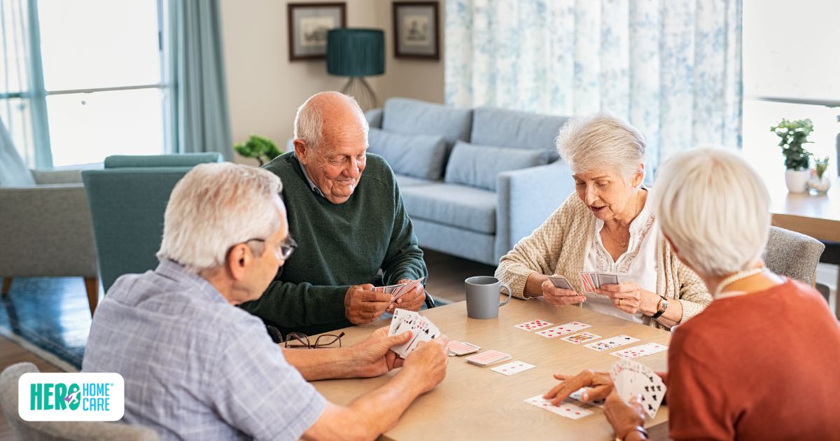 Group of older adults playing cards together as part of social activities for seniors.