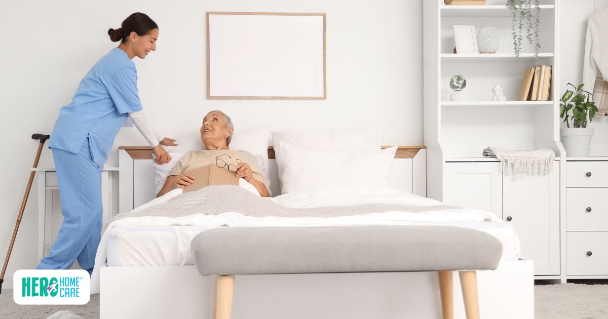 A caregiver adjusting pillows for an older adult in bed, ensuring comfort and safety for sleep as a caregiver.