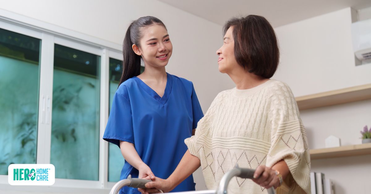  In-home caregiver supporting a senior with walking assistance, highlighting core caregiver responsibilities