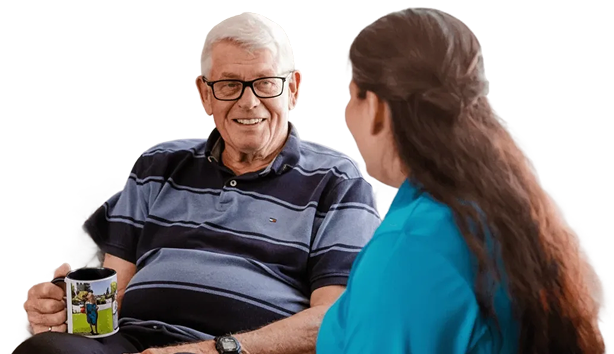 hero home care worker drinking coffee with a client