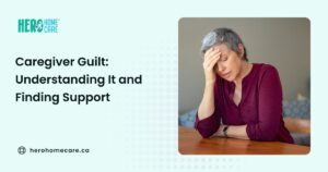 Woman sitting at a table with her hand on her forehead, reflecting emotional strain commonly associated with caregiver guilt.