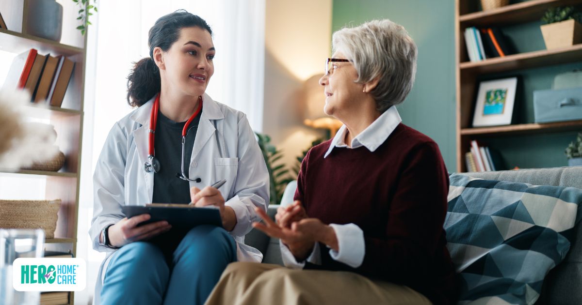 Doctor speaking with elderly woman at home to help her accept home care support