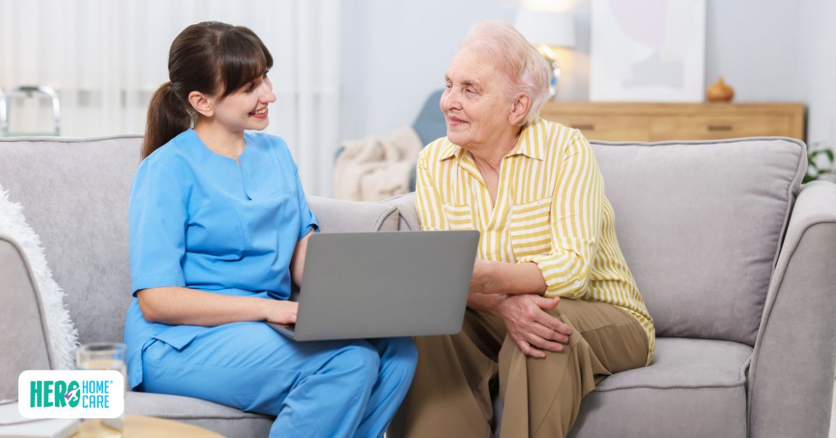 Caregiver reviewing care plan with senior during local home care support visit.