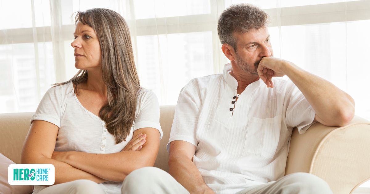 Siblings looking away from each other after conflict about sharing caregiving duties