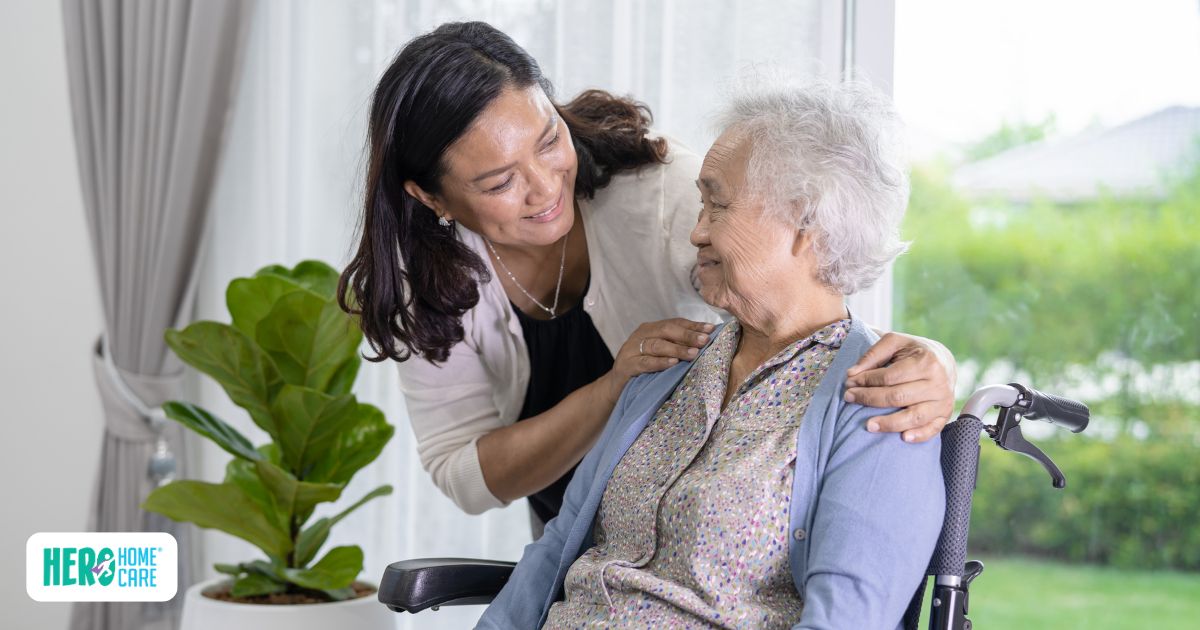 Family caregiver providing emotional support to an elderly stroke survivor at home