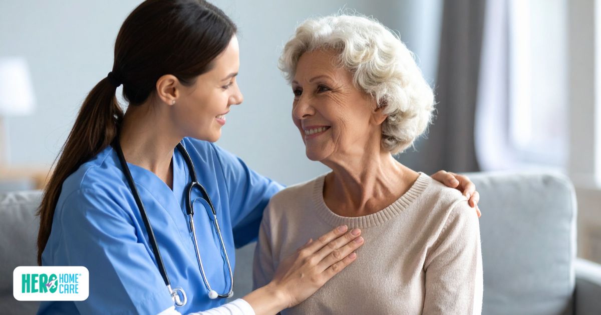 A caregiver and elderly patient sharing a positive moment, highlighting the importance of emotional well-being and long-term post-hospital recovery.