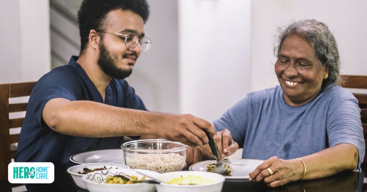 Elderly mother and adult son sharing a meal to make healthy eating more enjoyable for seniors