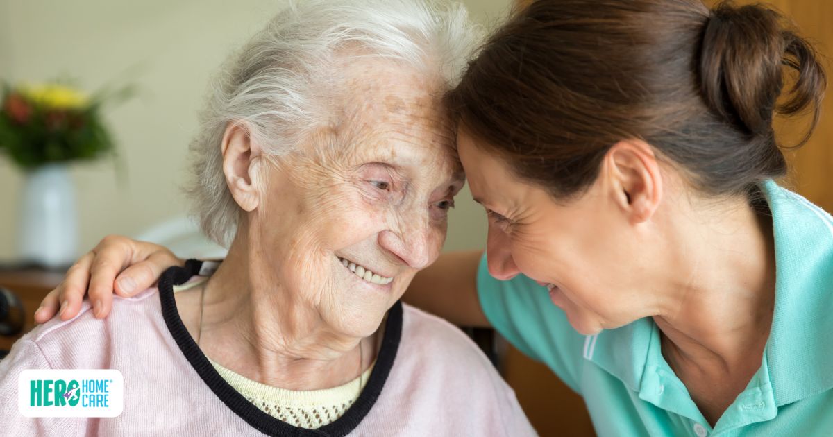 Caregiver providing emotional support to an elderly senior, representing mental and emotional health monitoring during home care recovery