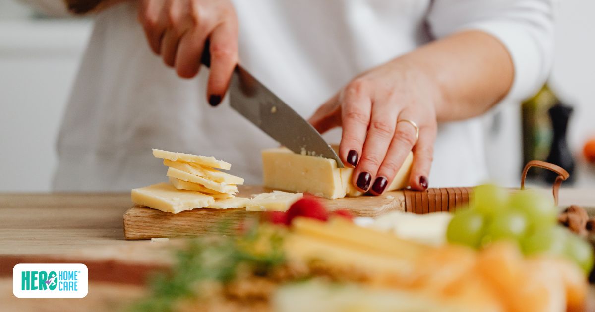Close-up of meal preparation with sliced cheese and vegetables for senior nutrition