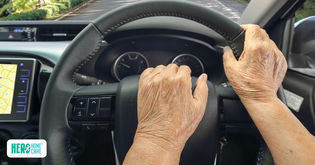 Elderly driver’s hands on a steering wheel representing the decision-making process around stopping driving for safety reasons