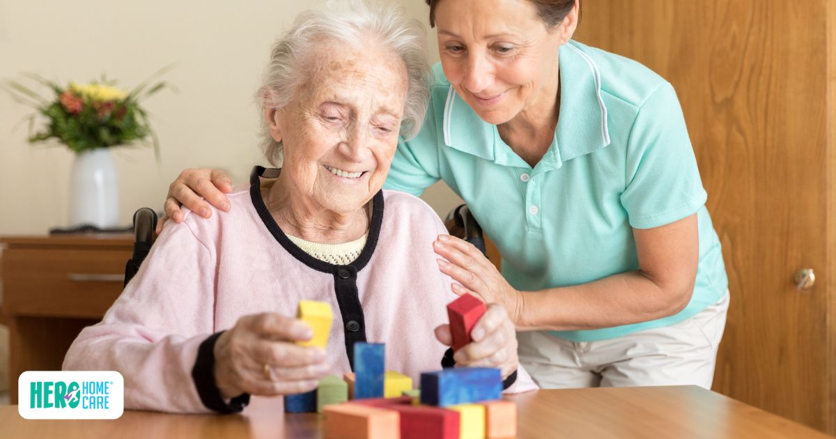 Caregiver guiding a senior with dementia through a simple afternoon activity, demonstrating the value of routine, interaction, and mental engagement