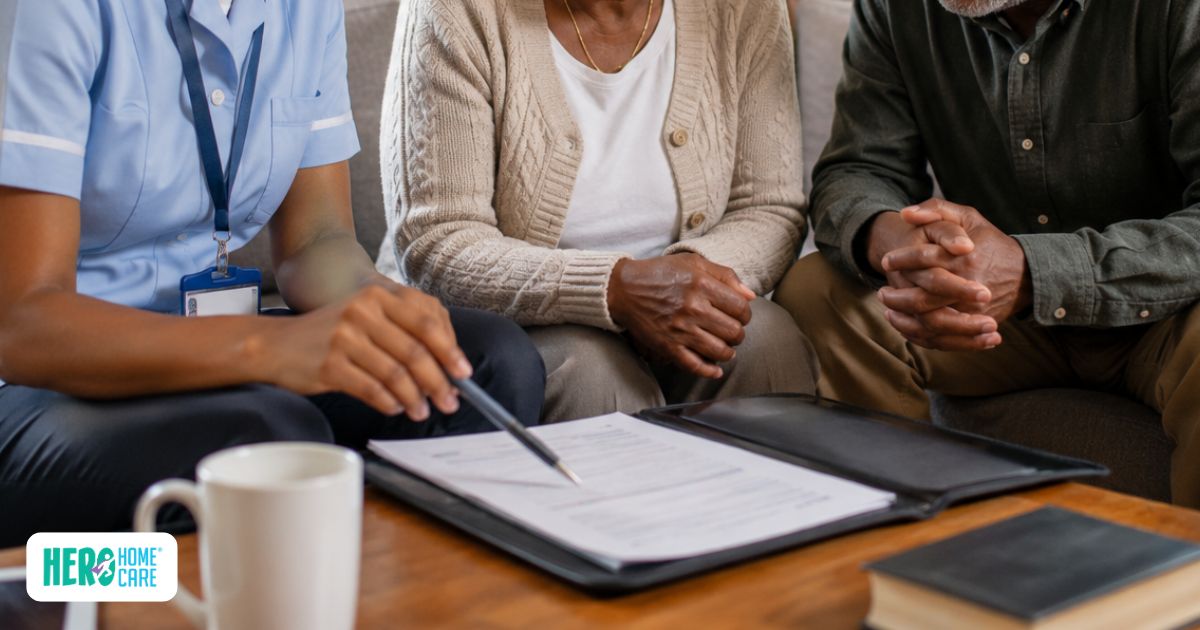End-of-life care planning discussion between healthcare professionals, older adults, and family members reviewing future care preferences and medical decisions