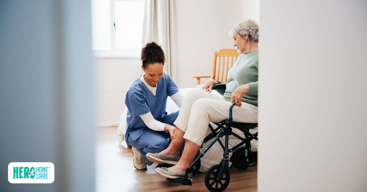 Professional caregiver assisting a senior in a wheelchair with post-surgical mobility and personal care support at home, illustrating the types of home care often needed during recovery