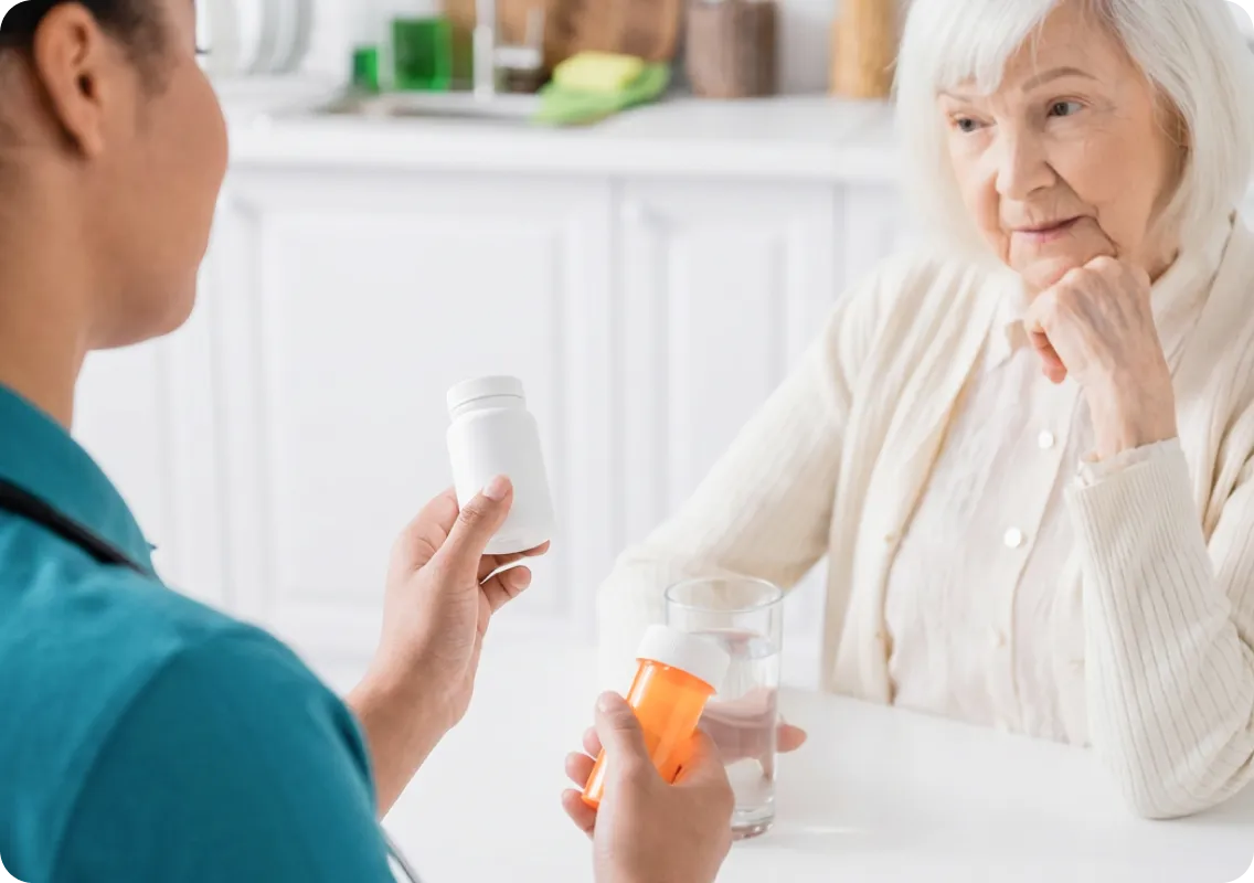Caregiver assisting a senior with personal care at home