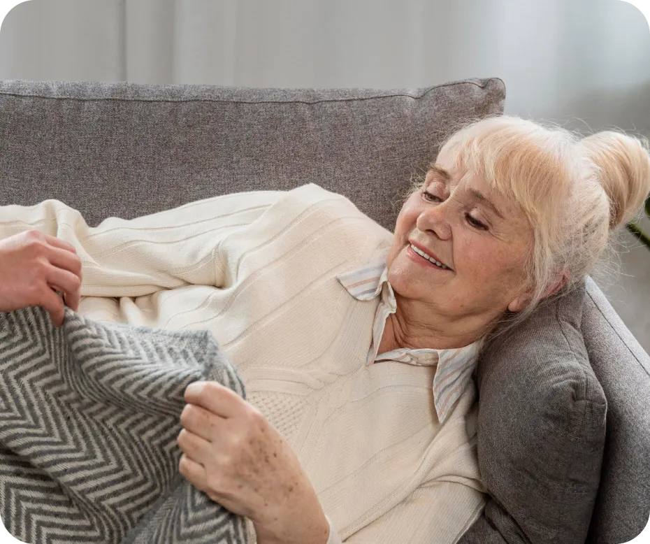 Caregiver helping a stroke survivor with safe mobility at home