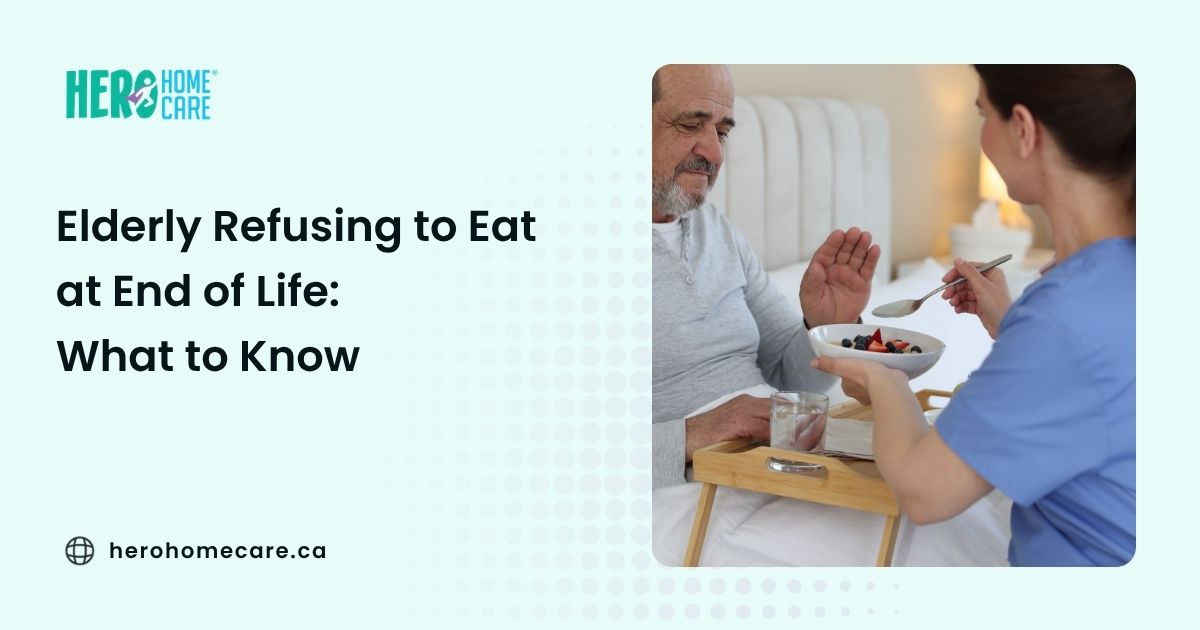 Caregiver offering food to an older adult in bed who gently declines, illustrating reduced appetite and compassionate end-of-life care support.