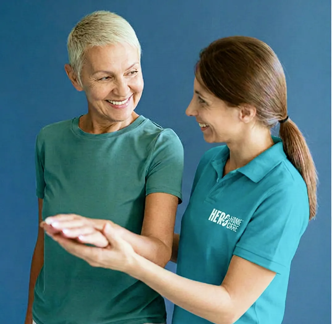 Hero Home Care nurse supporting a senior with Parkinson's at home