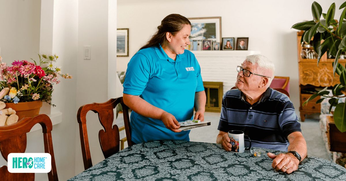 Caregiver supporting a senior with medication management and companionship at home.