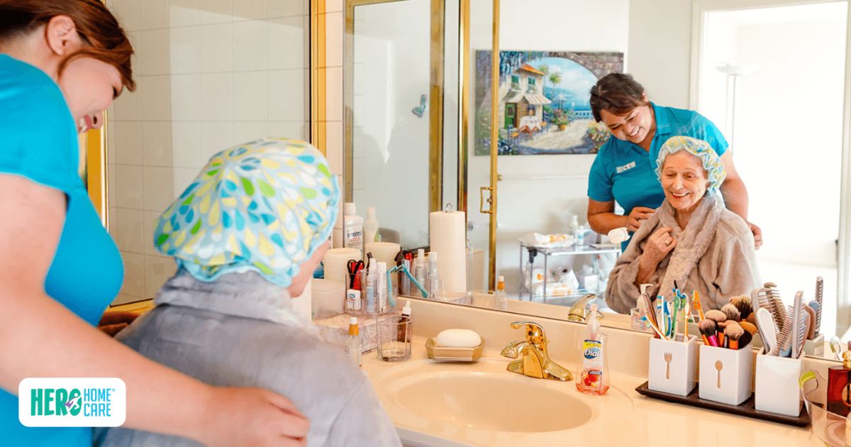Caregiver assisting an older adult with personal care at home to support aging in place in North Vancouver.